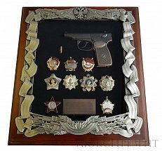 Панно с пистолетом Макарова и наградами СССР